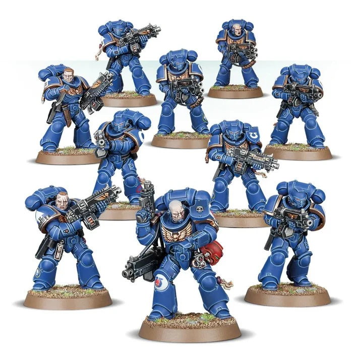 Ten blue-armored sci-fi soldier miniatures with gold trim holding rifles, standing on textured circular bases.
