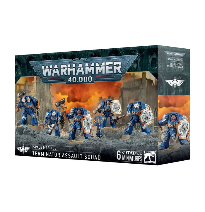 Box art featuring five blue-armored Space Marines with hammers and shields on a rocky terrain against a fiery orange sky.