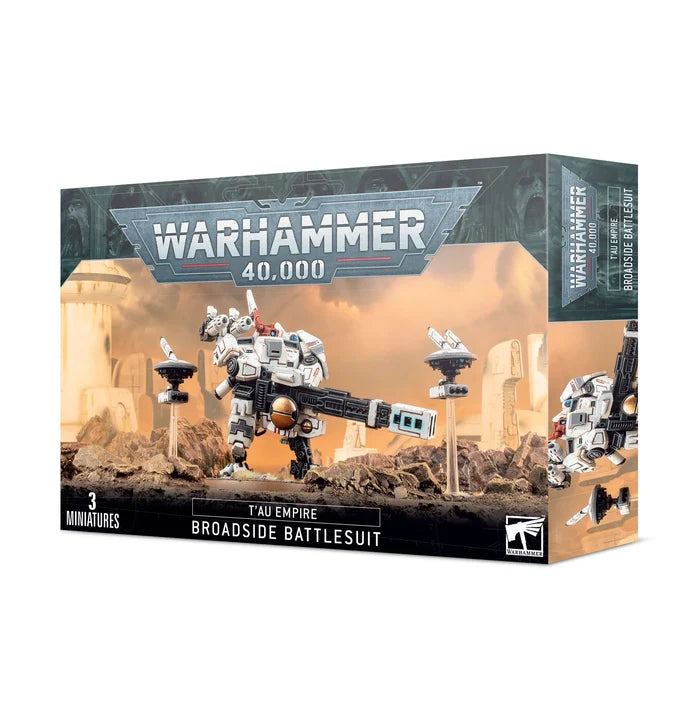 White bipedal mech with a long black railgun and two drones on a desert-themed Warhammer 40,000 box art.