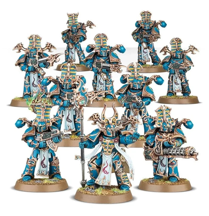 Ten teal and gold armored miniatures with striped Egyptian-style headgear and weaponry on circular bases.