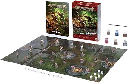 Fantasy tabletop set with miniatures on a game board, handbook, red box, paint pots, dice, and a paintbrush.