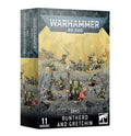 Angled box for 11 green miniatures on grey rocks against a hazy yellow background with the Warhammer 40,000 logo.