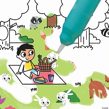 Teal water pen coloring a cartoon picnic scene with rabbits and a boy, revealing hidden colors on the paper.