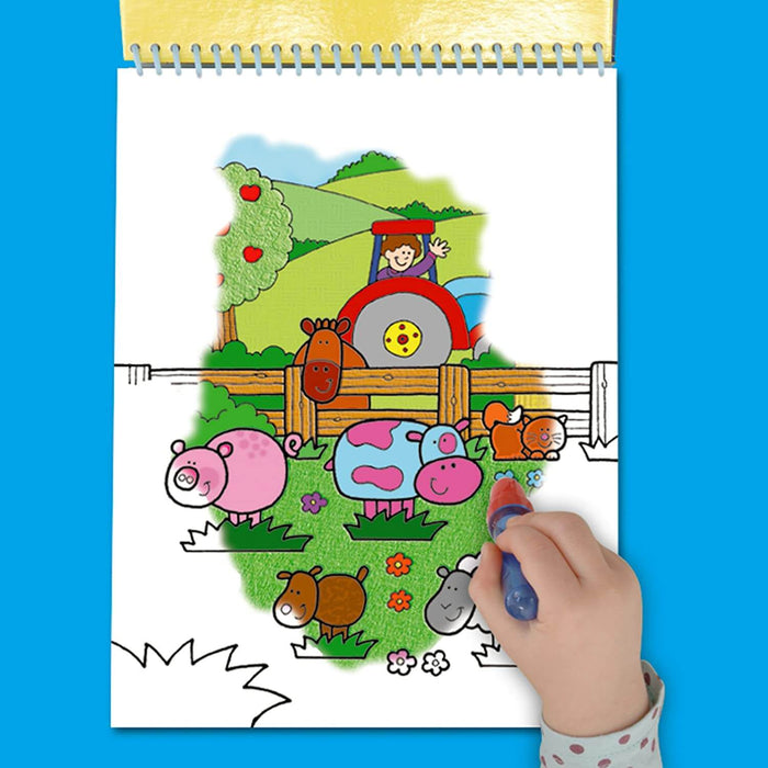Child using a water pen to color a farm scene with a tractor and animals on a white spiral-bound water reveal pad.
