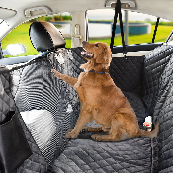 Waterproof pet car back seat protector with mesh window and storage pocket, ideal for car travel with pets.