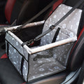 Grey waterproof pet car seat cover with bone paw print pattern, designed for cats and dogs to protect car seats.