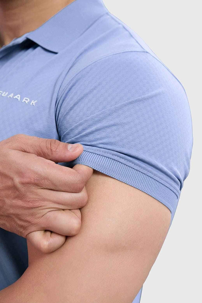 Light blue Wave Polo T-shirt by Fuaark Nz, featuring a classic polo collar and short sleeves, made from soft cotton fabric.