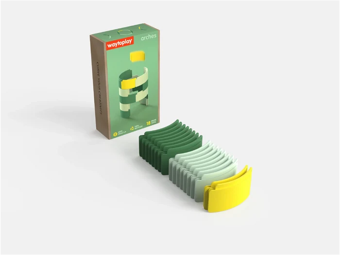 18 dark green, light green, and yellow curved toy arches neatly stacked next to their illustrated product box.