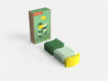 18 dark green, light green, and yellow curved toy arches neatly stacked next to their illustrated product box.