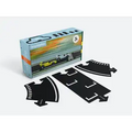 Blue box next to three black flexible rubber road pieces featuring white racing stripes and interlocking tabs.
