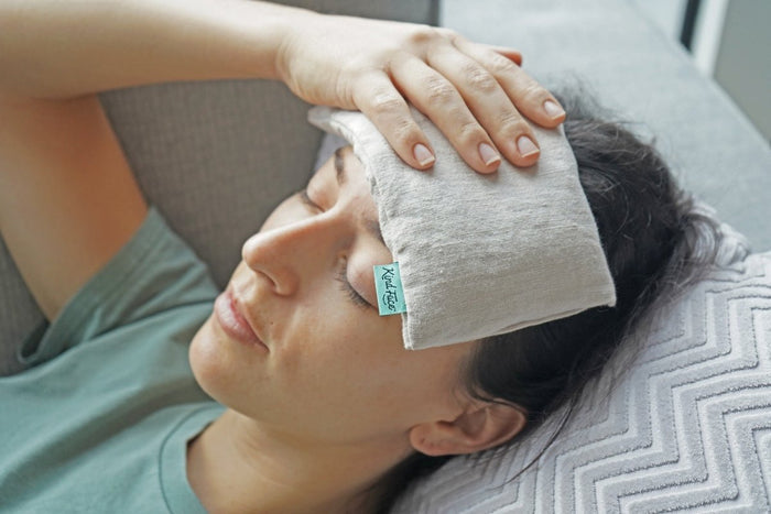 Weighted eye pillow from Do Not Disturb Sleep Company with a soft fabric cover and discreet weight for relaxation.