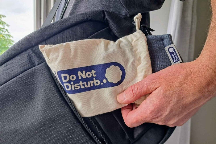 Weighted eye pillow by Do Not Disturb Sleep Company, soft fabric with gentle weight for relaxation and eye comfort.