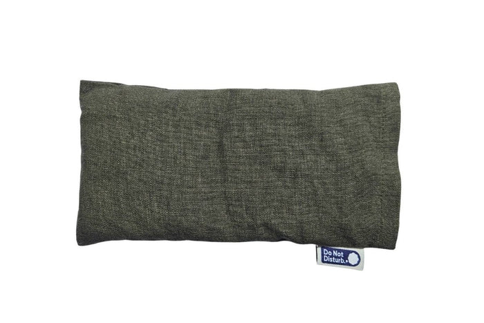 Weighted eye pillow from Do Not Disturb Sleep Company with soft fabric and gentle weight for relaxation and eye comfort.