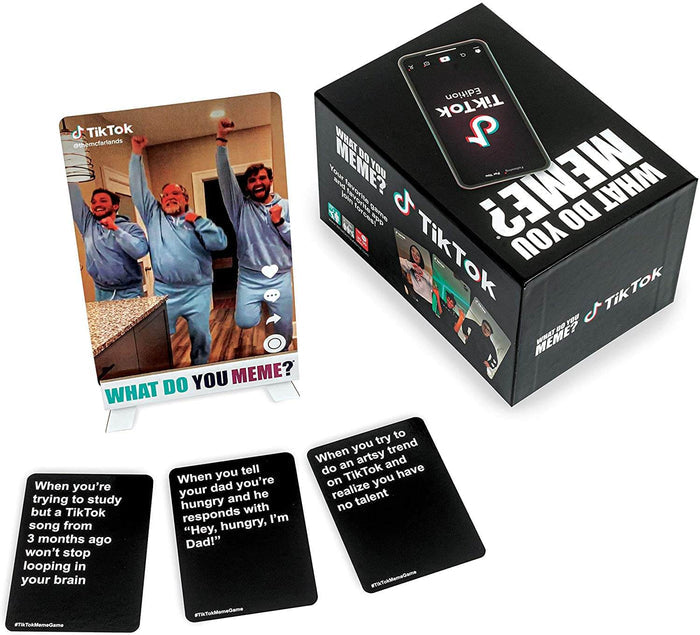 Black game box with TikTok logo, three black caption cards, and a photo card on a stand showing three men dancing.