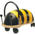 Bee-themed ride-on toy with yellow and black stripes, curved handle, spring antennae, and wheels on a wooden base.