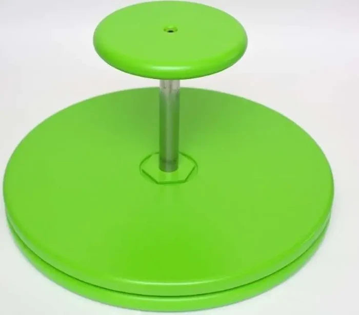 Bright green spinning toy with a large circular base and a small circular steering wheel on a central metal pole.