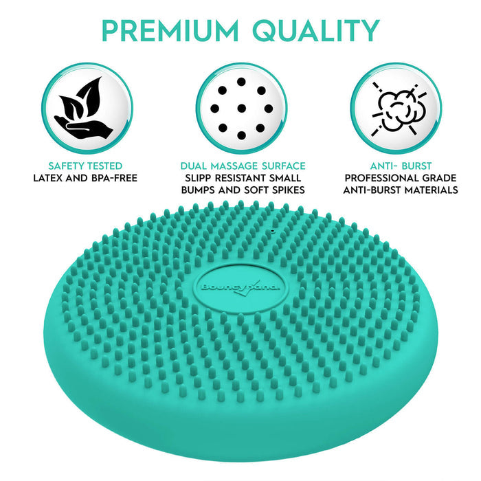 Teal circular cushion with soft spikes and icons for safety, dual massage surfaces, and anti-burst material.