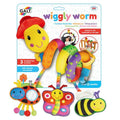 Colorful plush spiral toy with a red hat and hanging ladybug, butterfly, and bee toys on retail packaging.