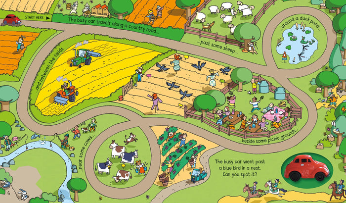 Children's board book featuring a winding track through farm illustrations with a small red wind-up toy car.