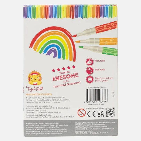 Back of white marker box with a drawn rainbow, three colorful pens, five stars, and safety certification icons.