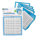 Ten blue and white laminated square boards showing a 1 to 100 number grid and additional blank practice grids.