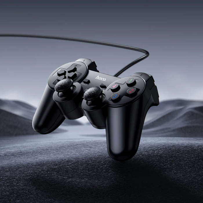 Techplus wired gaming controller for PC with USB connection, featuring ergonomic design and multiple buttons for gaming.