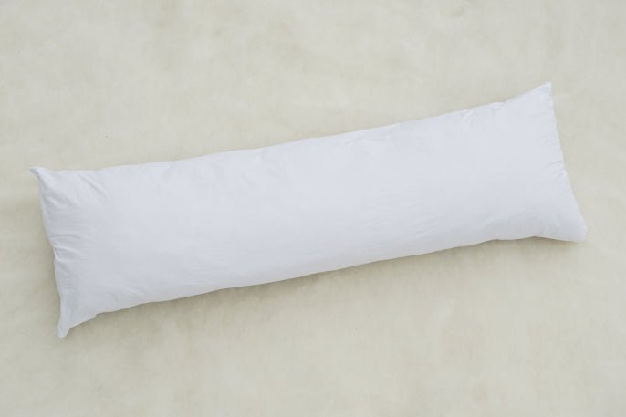 Wisewool™ Body Pillow by Do Not Disturb Sleep Company, showing a soft, ergonomic pillow designed for full-body support.