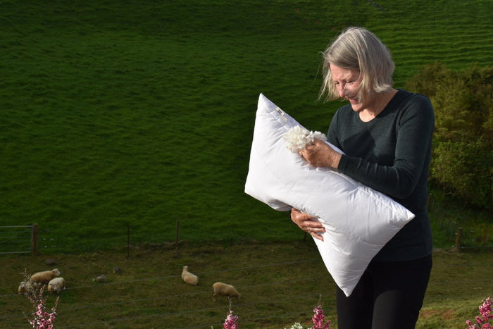 Wisewool™ Cloud Pillow by Do Not Disturb Sleep Company, soft and plush pillow with cloud-like appearance and textured fabric.