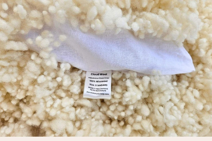 Wisewool™ Cloud Pillow by Do Not Disturb Sleep Company showing soft, plush pillow with cloud-like texture for comfortable sleep.