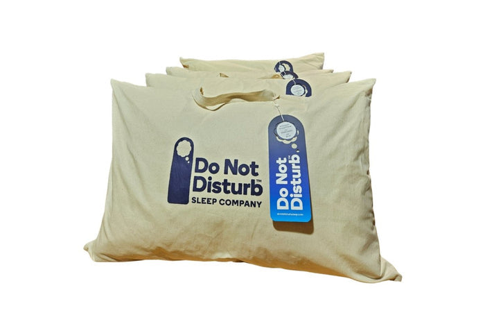 Wisewool™ Cloud Pillow from Do Not Disturb Sleep Company showing a plush, white pillow with a soft, cloud-like appearance.