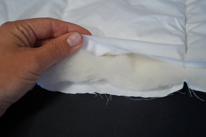 Wisewool™ duvet from Do Not Disturb Sleep Company, showcasing a cozy, plush duvet with soft fabric and natural filling.