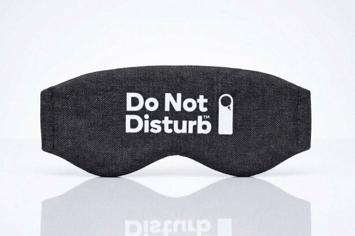 Black Wisewool™ Sleep Mask by Do Not Disturb Sleep Company, soft fabric with adjustable strap for comfortable sleep.