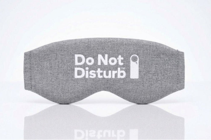 Wisewool™ Sleep Mask by Do Not Disturb Sleep Company in lunar grey, soft fabric covering eyes for restful sleep.