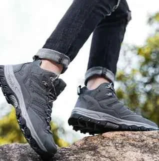 WOLFF waterproof high-top trekking shoes by Mead's Supply & Equipment Outfitters, black hiking boots with enhanced grip sole.