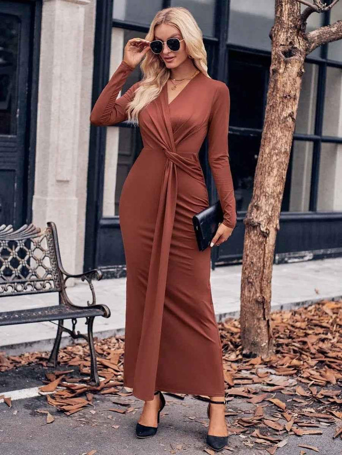Black women's chic solid V-neck waist dress by Stylish 3Sixty5, featuring a stylish fit and elegant design.