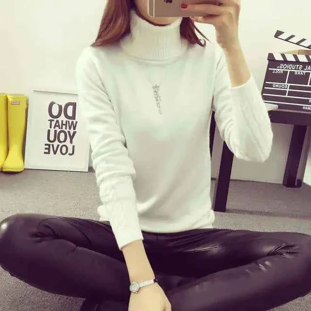 Women's wool high neck sweater by Mead's Supply & Equipment Outfitters, slim fit with long sleeves, perfect for winter warmth.