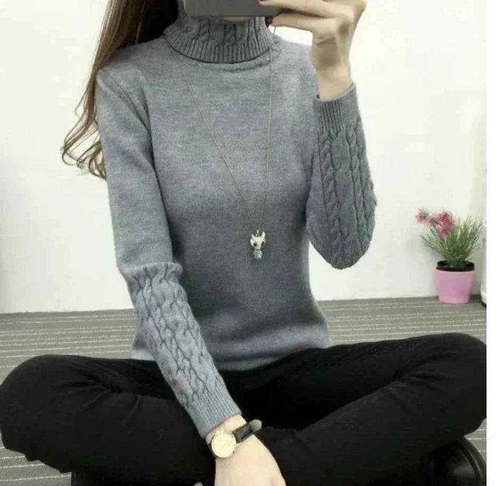 Women's wool high neck sweater with slim fit and long sleeves, designed for winter warmth, by Mead's Supply & Equipment Outfitters.