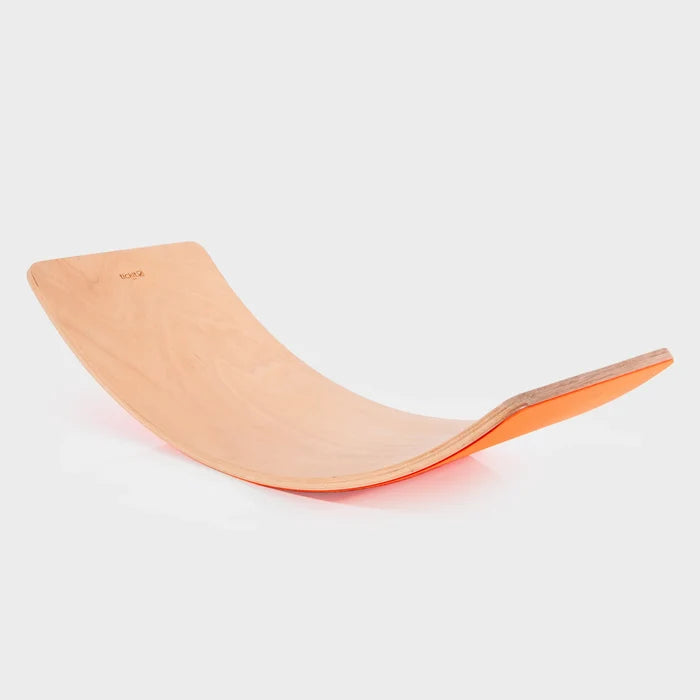 Curved natural wood balance board featuring a bright orange felt underside.