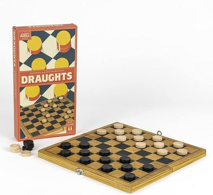 Folding wooden draughts board with black and light wood pieces next to an orange illustrated box.