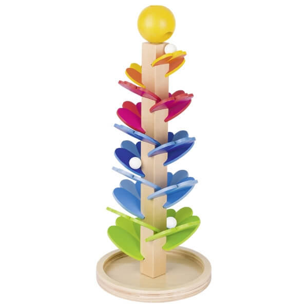 Rainbow wooden tower with leaf-shaped ramps spiraling down a post, topped with a yellow ball and small marbles.