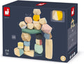 Dark blue toy box featuring 20 faceted wooden blocks in pastel and natural tones, stacked into a balanced tower.