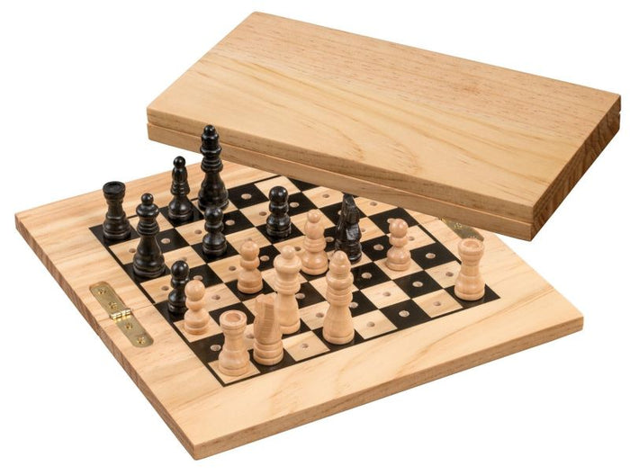 Small wooden travel chess set with pegged black and light pieces on a folding board that doubles as a storage case.