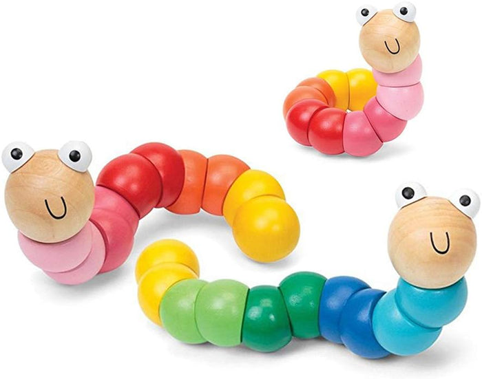 Three colorful wooden worm toys with rainbow-colored segmented bodies and smiling natural wood heads in twisted poses.