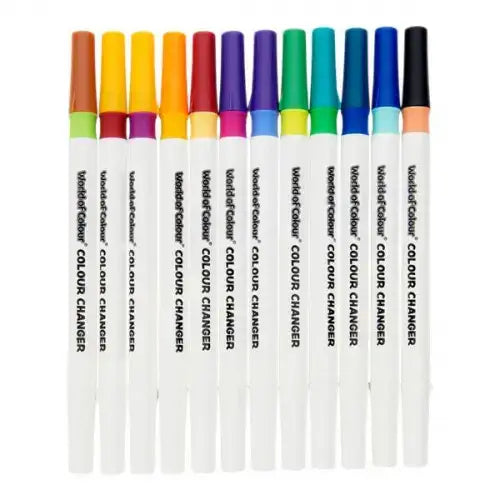 Twelve white magic markers with vibrant, multi-colored caps and matching bands lined up vertically in a row.