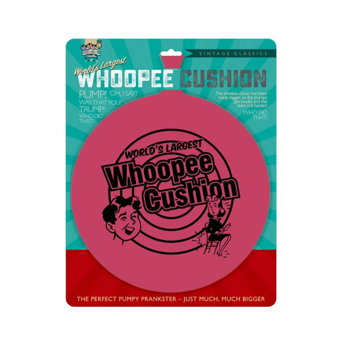 Giant pink whoopee cushion on teal retro-style packaging with cartoon illustrations of a prank.
