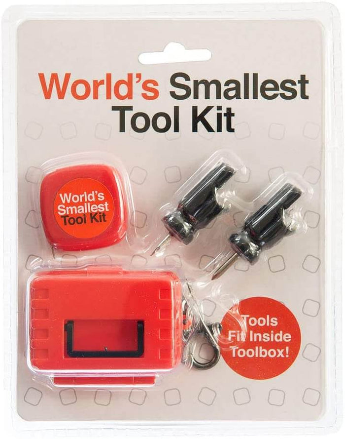 Miniature toy tool kit in clear packaging with a tiny red tape measure, two black screwdrivers, and a red toolbox.