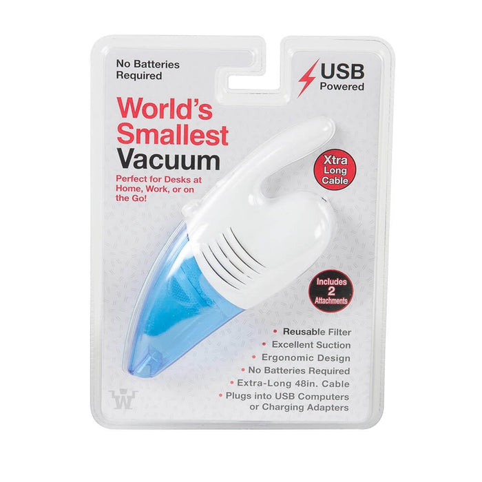Handheld white and blue mini vacuum in clear retail packaging with red and black text and USB power icons.