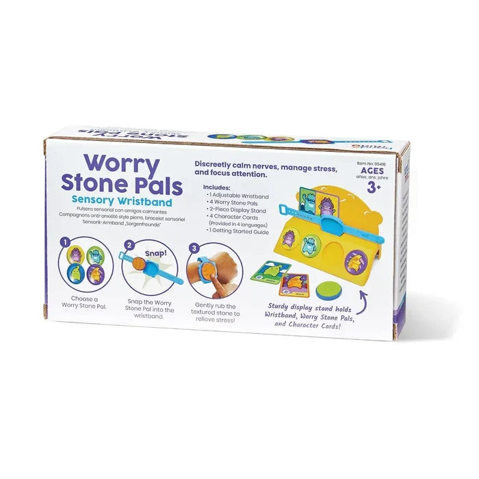 Box for Worry Stone Pals showing a blue sensory wristband, colorful character stones, and a yellow display stand.
