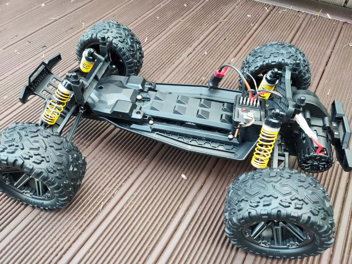 Large off-road RC Truggy with two batteries, high-speed 45km/h, 1:8 scale, suitable for off-road racing and outdoor fun.