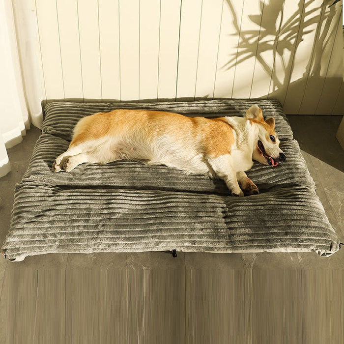 Soft XL fleece fabric pet bed in beige with cushioned edges, ideal for cozy comfort for dogs or cats.